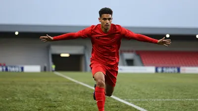 Stoke City manager Mark Robins says Eric Bocat is thriving in a wing-back role, with the system helping the Potters take...